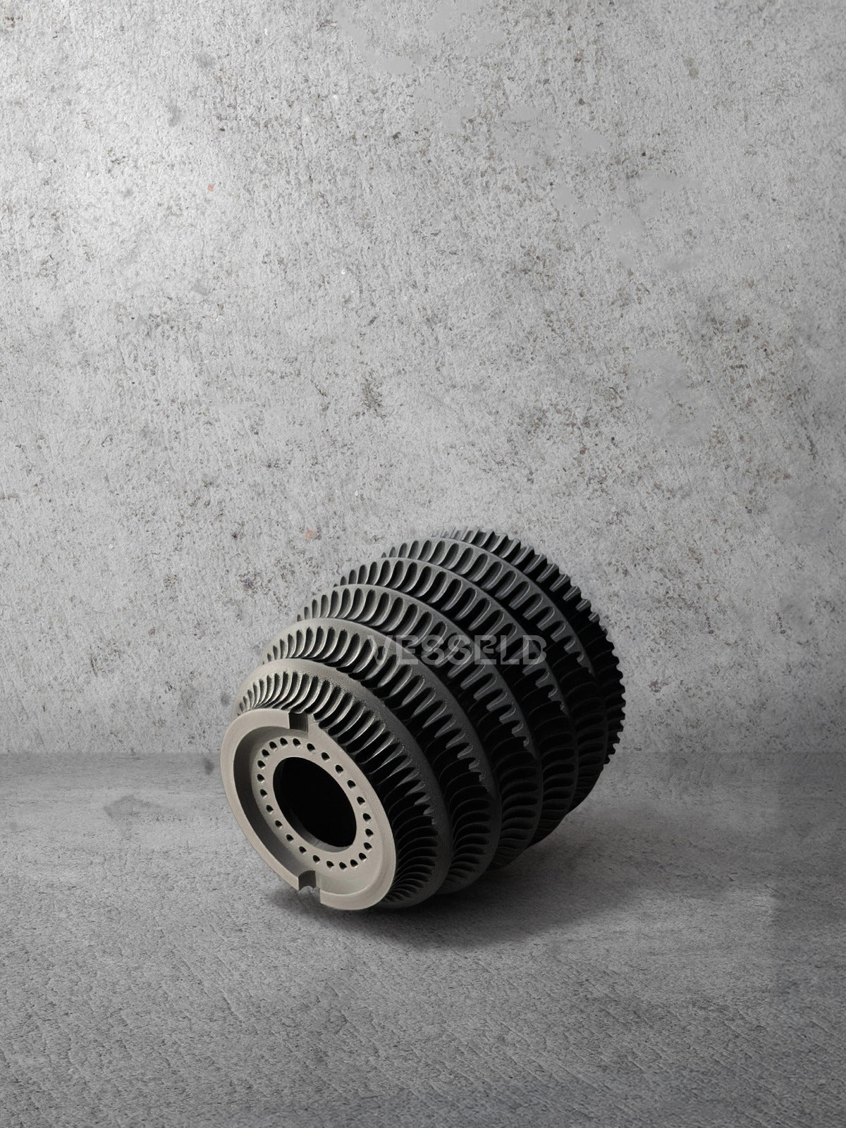 Vesseld.com Bottom of 3D Printed Textured Design Black Cylindrical Planter on a gray concrete background
