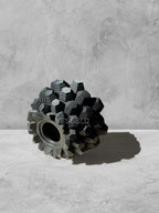 Vesseld.com 3D Printed Textured Design Black Round Planter on a gray surface