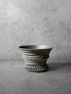 Vesseld.com 3D Printed Planter with textured design on a gray surface