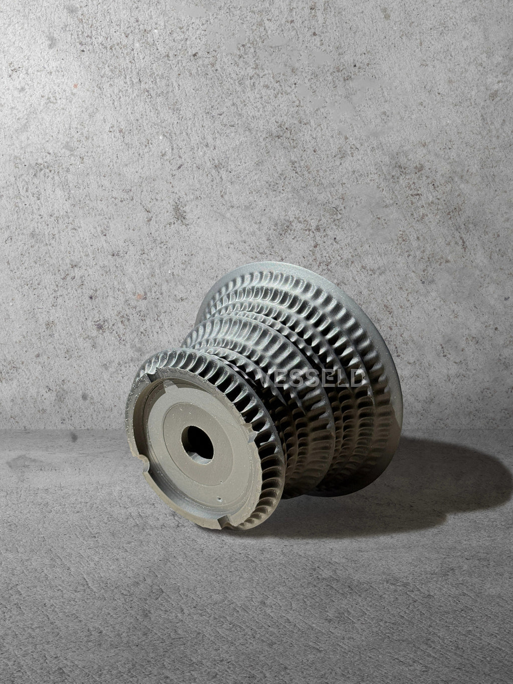 Vesseld.com 3D Printed Short Planter with textured design on a gray surface