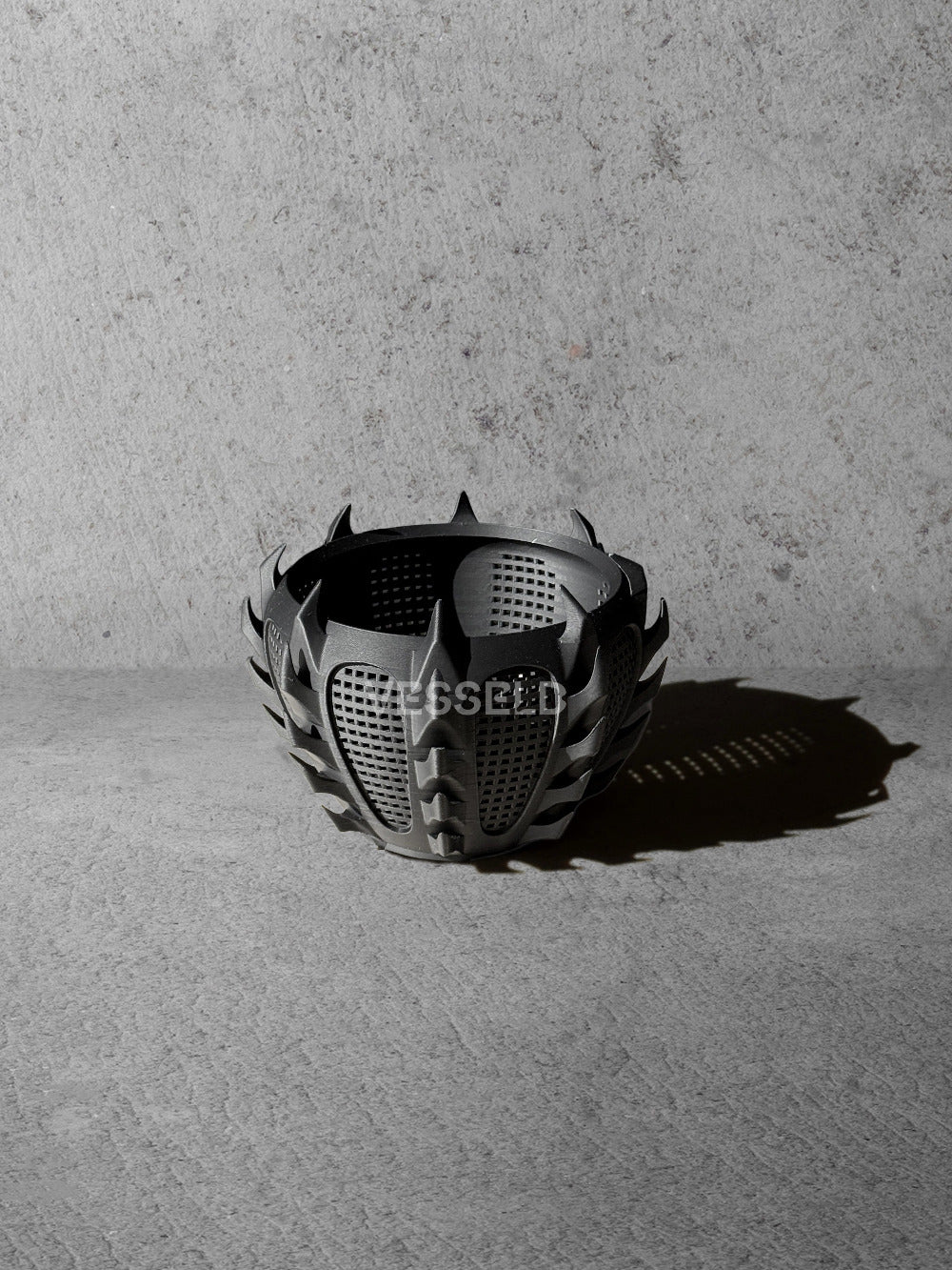Vesseld.com 3D Printed Short Planter with textured design on a gray surface