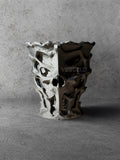 Vesseld.com Black textured skull-shaped 3D Printed Cylindrical Planter