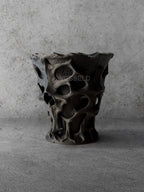 Vesseld.com Black textured skull-shaped 3D Printed Cylindrical Planter